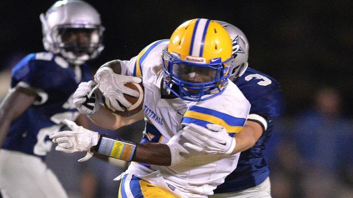 Running back Antoine Davis (2) and the Tattnall Square Trojans head to Washington-Wilkes on Friday for the GHSA Region 7-1A championship game.