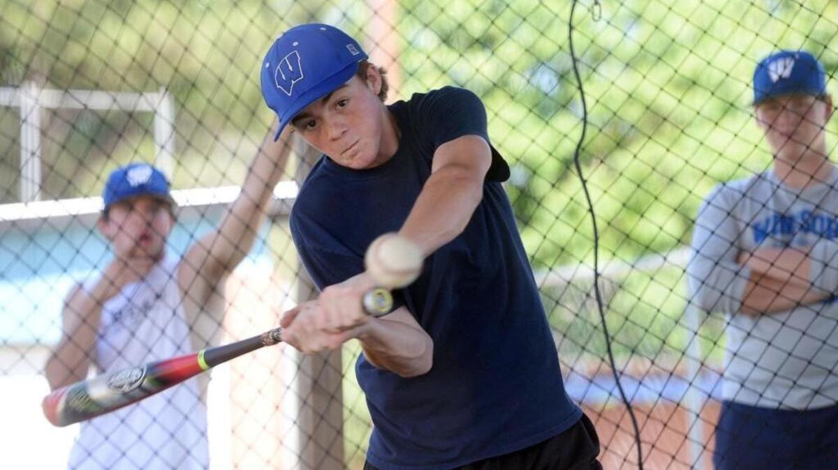 Windsor shortstop Brayden Leslie takes his cuts in the batting practice cage as he and his team prepare for the GISA semifinals.