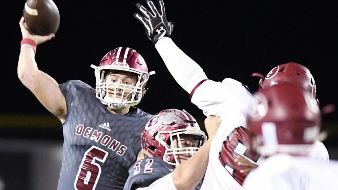 Warner Robins quarterback Dylan Fromm (1) throws a pass downfield during the Demons first round playoff game against South Effingham Nov. 10.