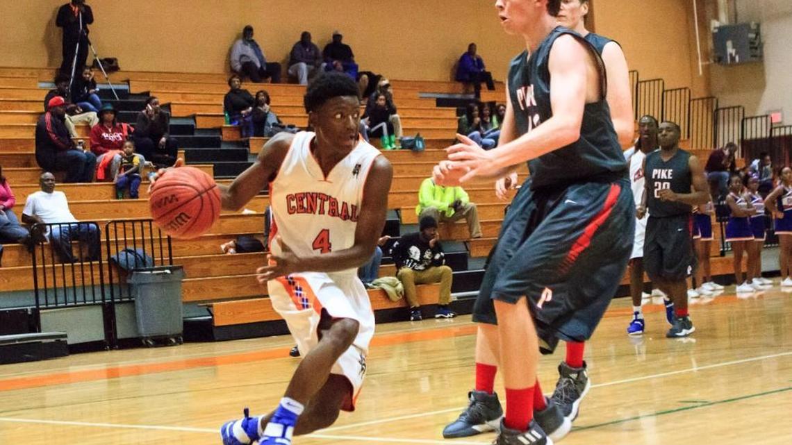 Driving the baseline, Central's Tyrice Paul (4) looks to pass against Pike County in their GHSA Region 4-3A matchup.