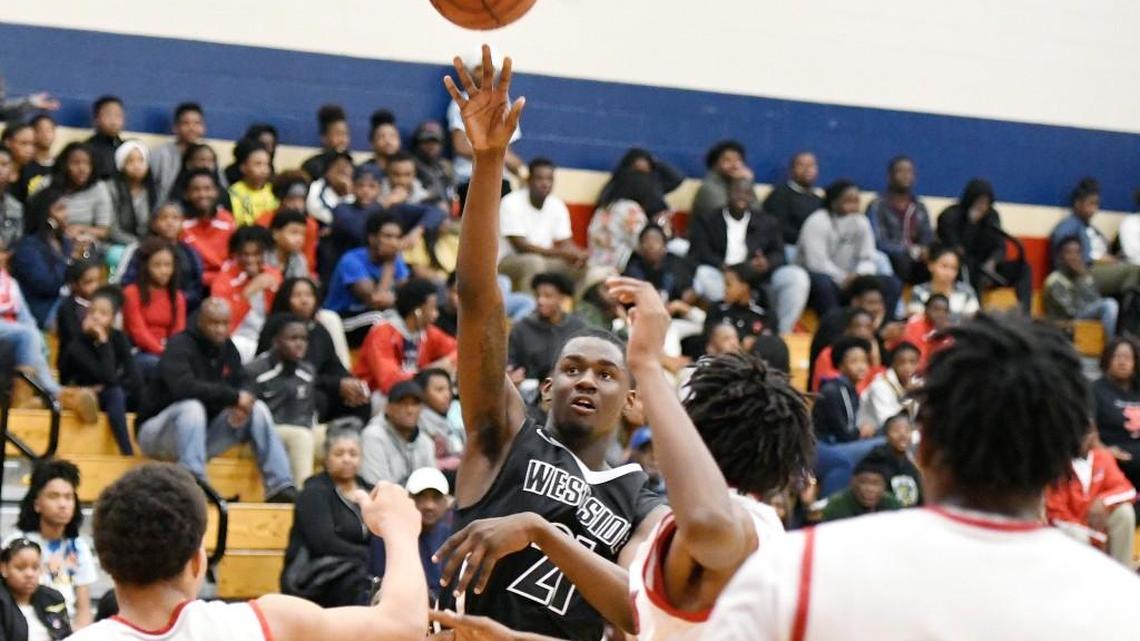 Westside guard Khavon Moore (21) led the Seminoles to the GHSA Class 3A semifinals.