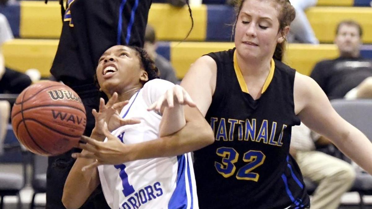 Wilkinson County senior guard Zhakire Simmons (1) is fouled by Tattnall Square’s Allie Gordon (32) during their game Jan. 20. The Warriors beat Tattnall and are in a tie for first place with Stratford in GHSA Region 7A-1A.