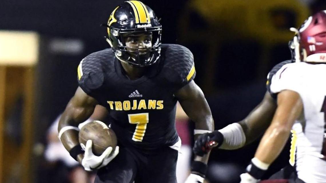 Kearis Jackson (7) and the Peach County Trojans are 7-1 overall and 4-0 in GHSA Region 4-3A.