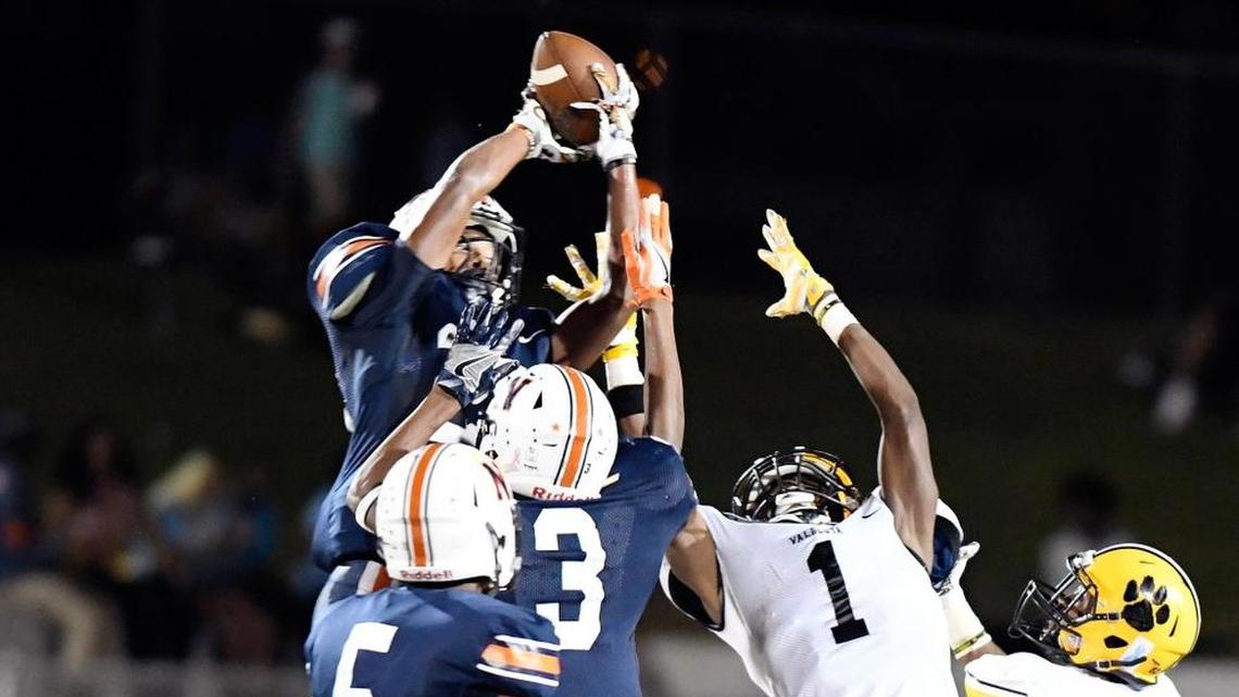 Northside defensive back Alijah McGhee, back, and the Eagles travel to Lee County on Friday.