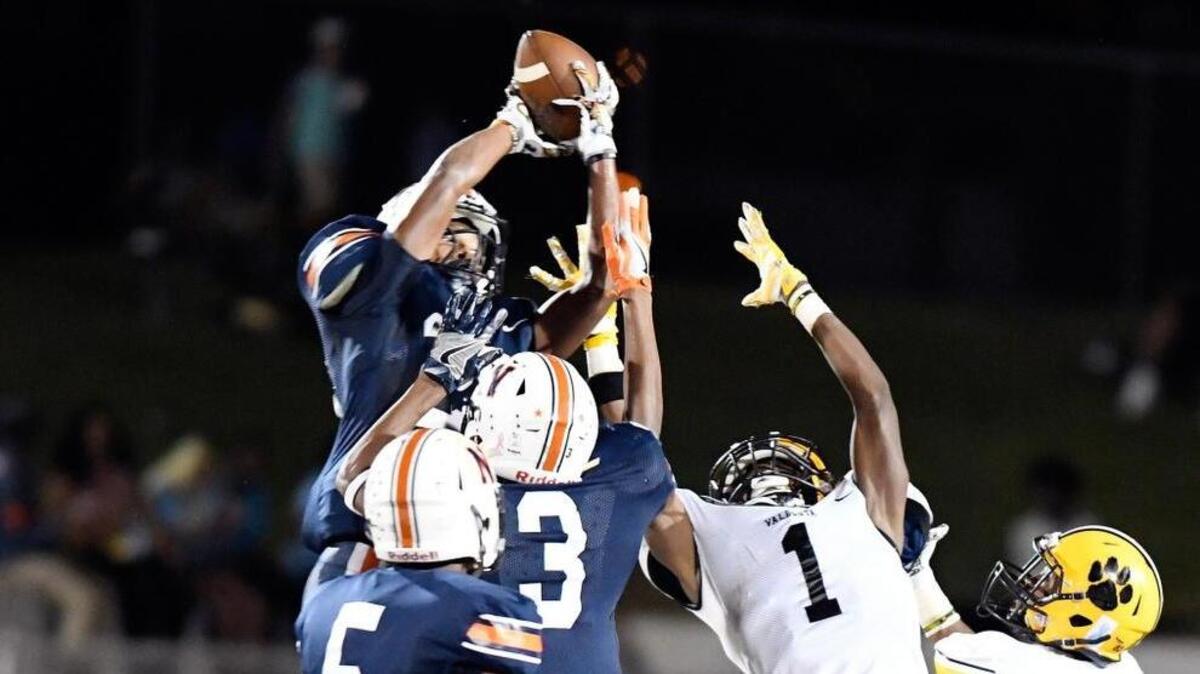 Northside defensive back Alijah McGhee, back, and the Eagles travel to Lee County on Friday.
