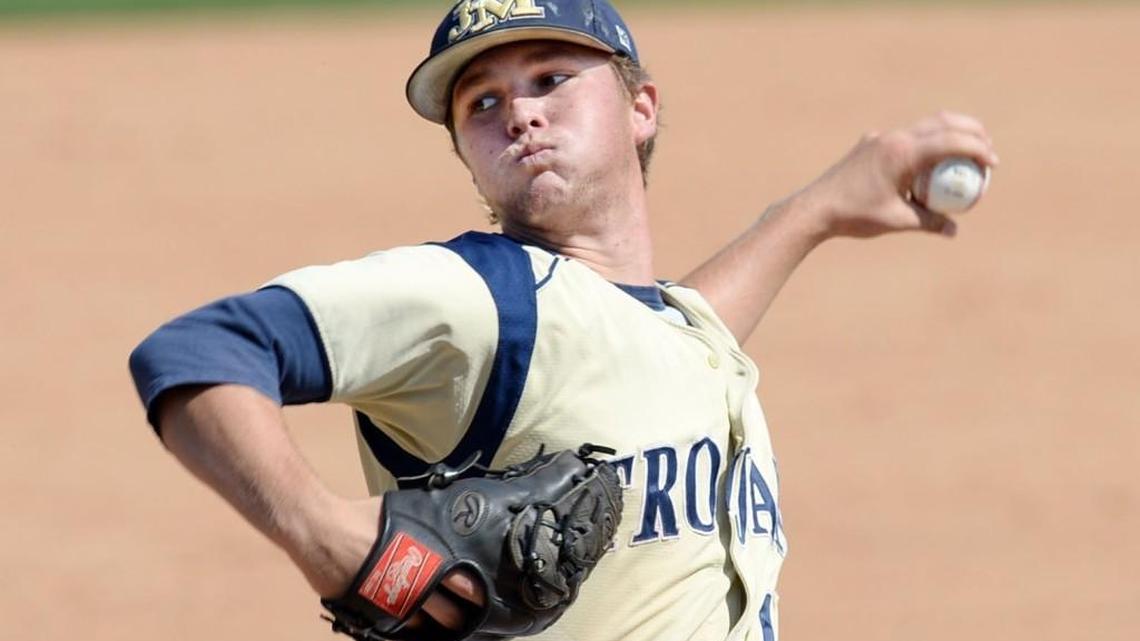 John Milledge pitcher Trevor Evans bears down on Trinity Christian-Sharpsburg during Friday’s game in the GISA Class 3A championship series.