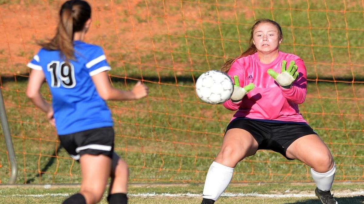 Howard keeper Kayleigh Buie makes a save during the second half Tuesday against Oconee County.