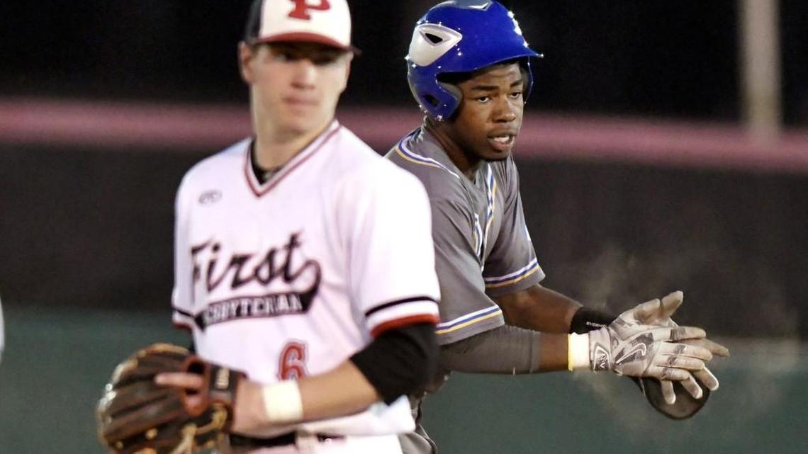 Tattnall's Logan Simmons (14) claps his hands after a two-run double in the top of the 3rd inning of their game at FPD Tuesday night.