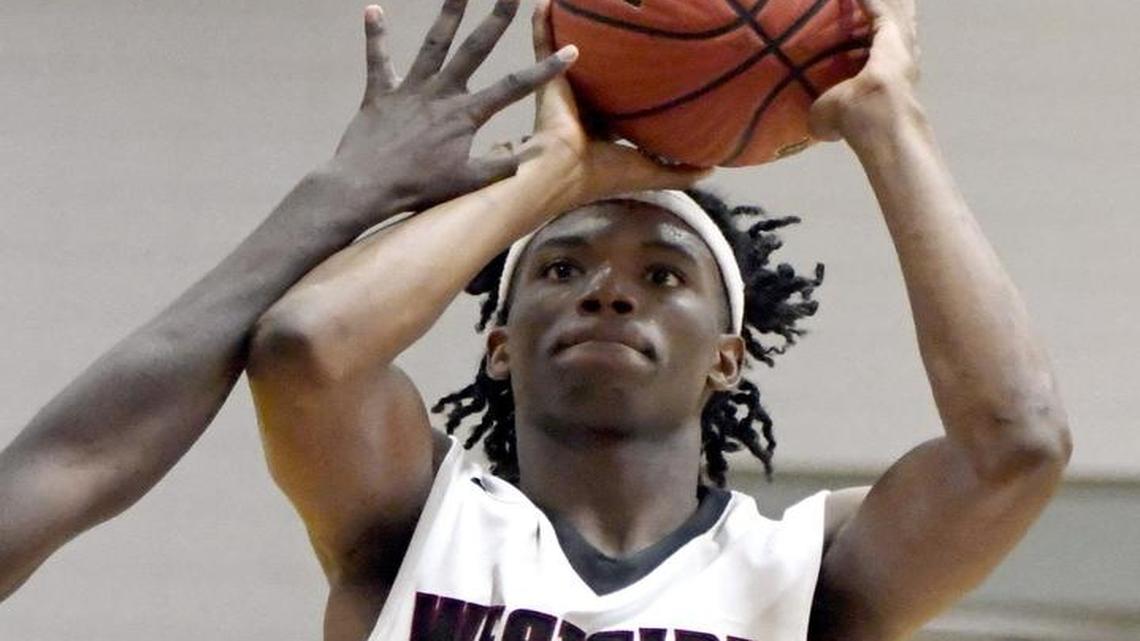 Westside's Trey Foster (5) goes up for a shot during their first round GHSA playoff game against Long County Saturday.