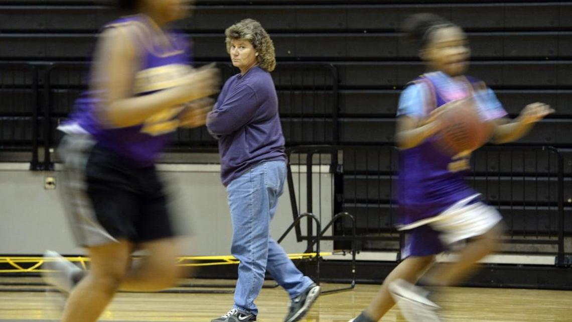 Bleckley County head coach Jenny Manning, center, watches her team practice fastbreaks Friday.