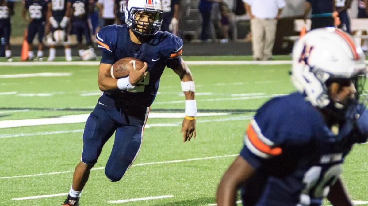 Northside’s Tobias Oliver (12) rushed for 202 yards and two touchdowns Friday against Ware County.