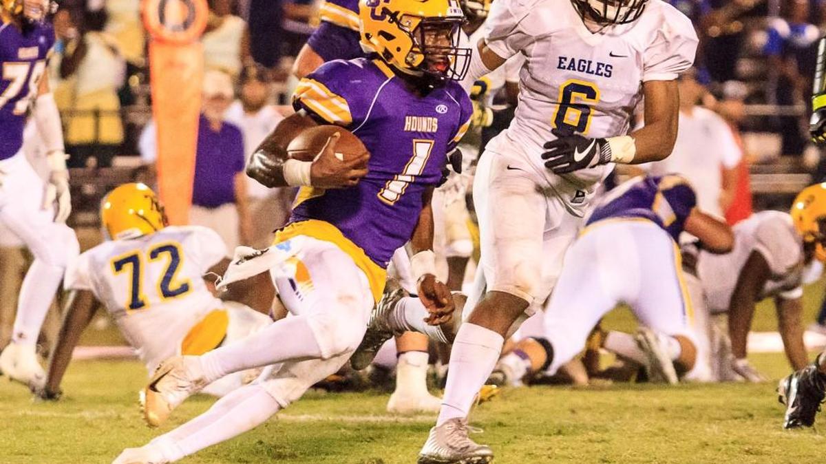 Jones County's Teldrick Ross (1) runs a quarterback keeper against Eagle's Landing in their Region 4-5A matchup.