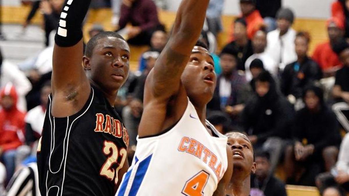 Central guard Kylan Hill (4) lays up a shot during the Chargers' game against Northeast earlier this month.