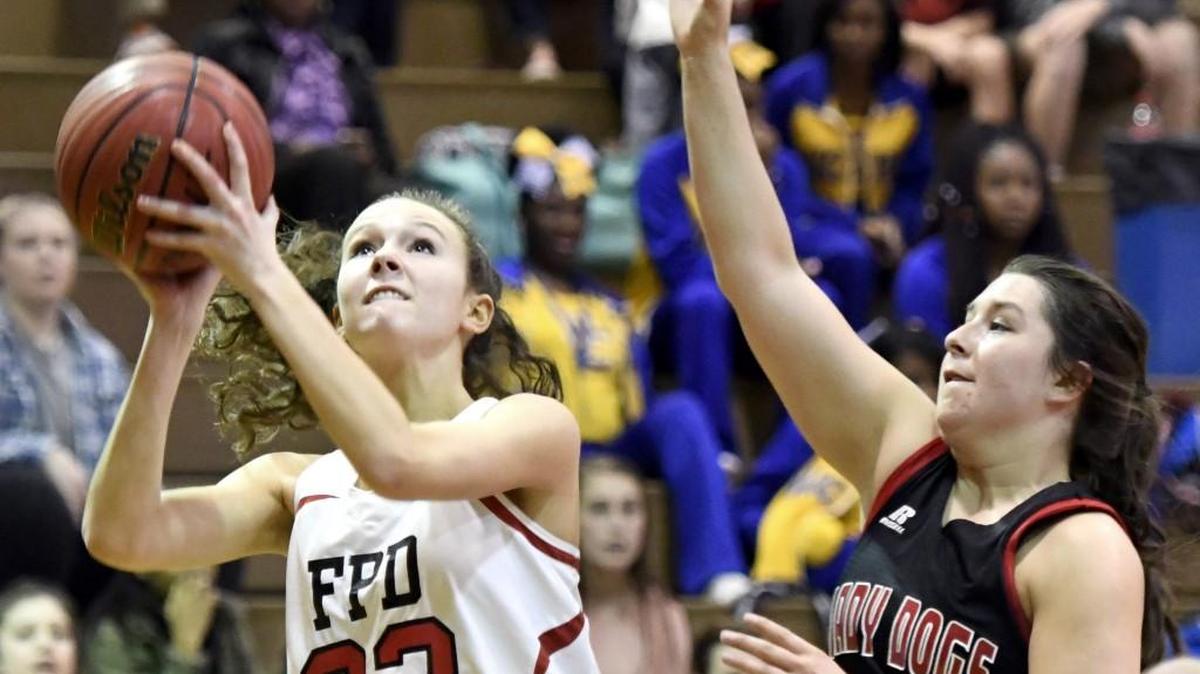 FPD’s Emma Lako (23) puts up a shot over GMC’s Cecilia Maldonado during the GHSA Region 7A-1A Tournament on Tuesday.