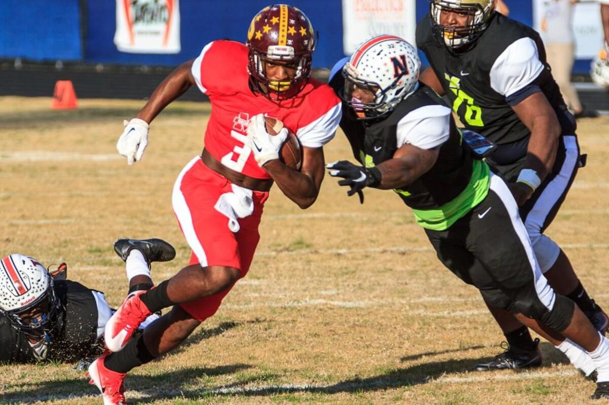 Jay Watkins (3) of Perry breaks through the line in the Middle Georgia All-Star Classic.