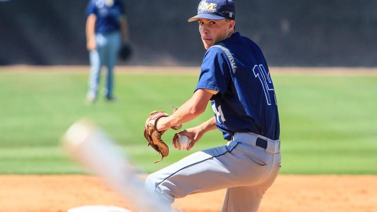 John Milledge’s Andrew Prestwood pitches in the second game of the Trojans’ GISA Class 3A title series against Trinity Christian-Sharpsburg.