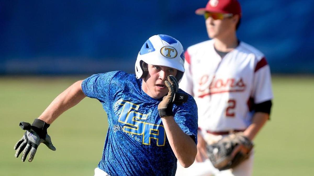 Tattnall Square’s Cory Bartholomew advances to third on a double by teammate Logan Finkduring in the second game of their GHSA championship series against Hebron Christian on Saturday afternoon.