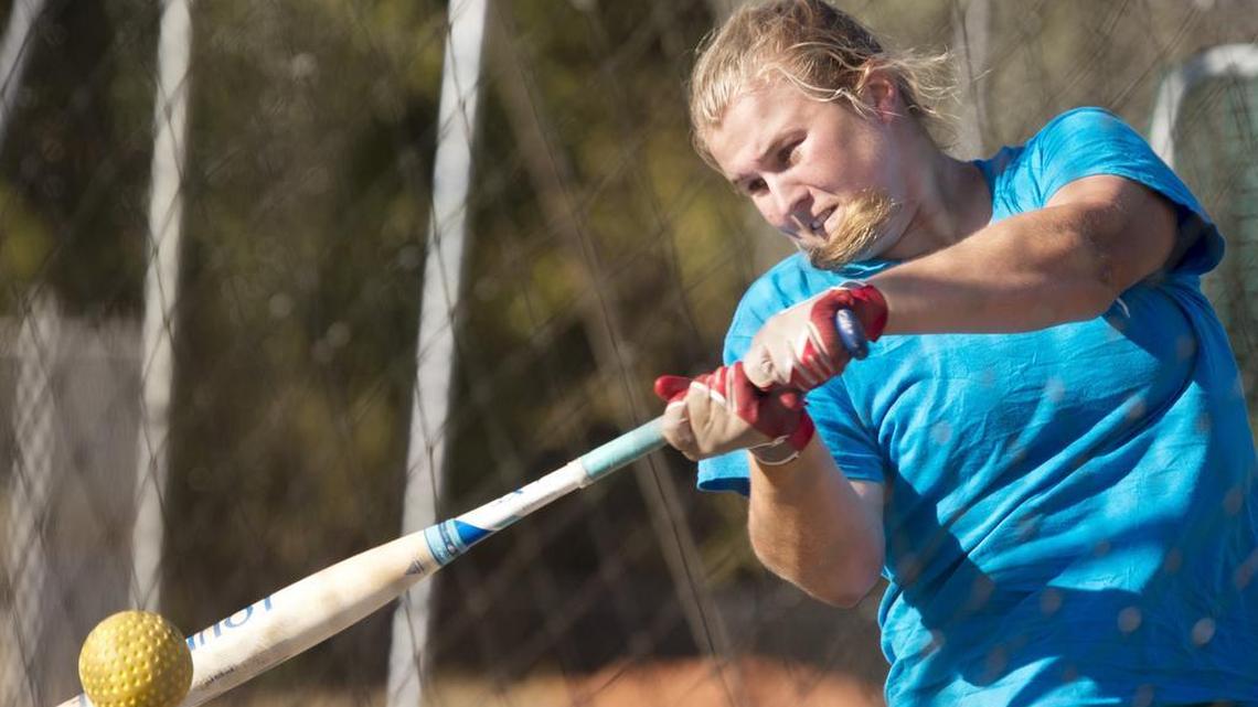 FPD senior catcher Allie Parkerson, batting .602 with 14 home runs, takes swings in the batting cage at practice Tuesday afternoon.