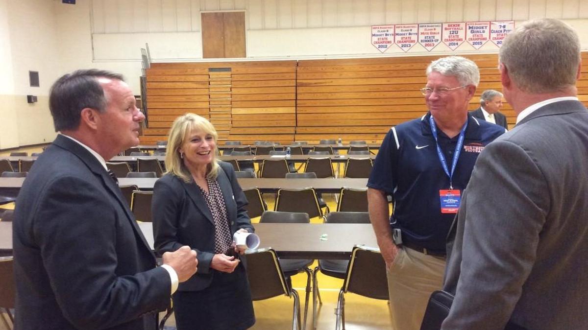 Incoming GHSA executive director Robin Hines, left, meets with GHSA associate director Penny Pitts and Northside athletics director and football head coach Kevin Kinsler following the association’s May 16 executive committee meeting in Thomaston.