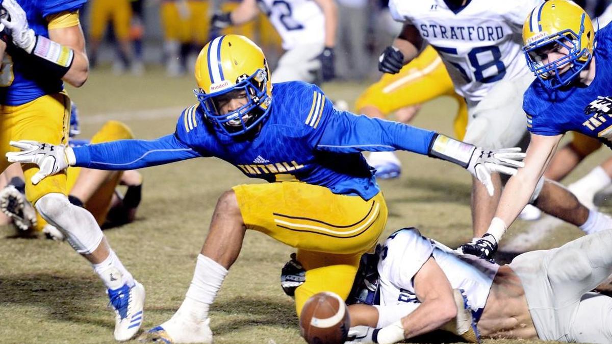 Tattnall running back Destin Mack (4) fumbles the ball during the Trojans’ game against Stratford on Friday night.