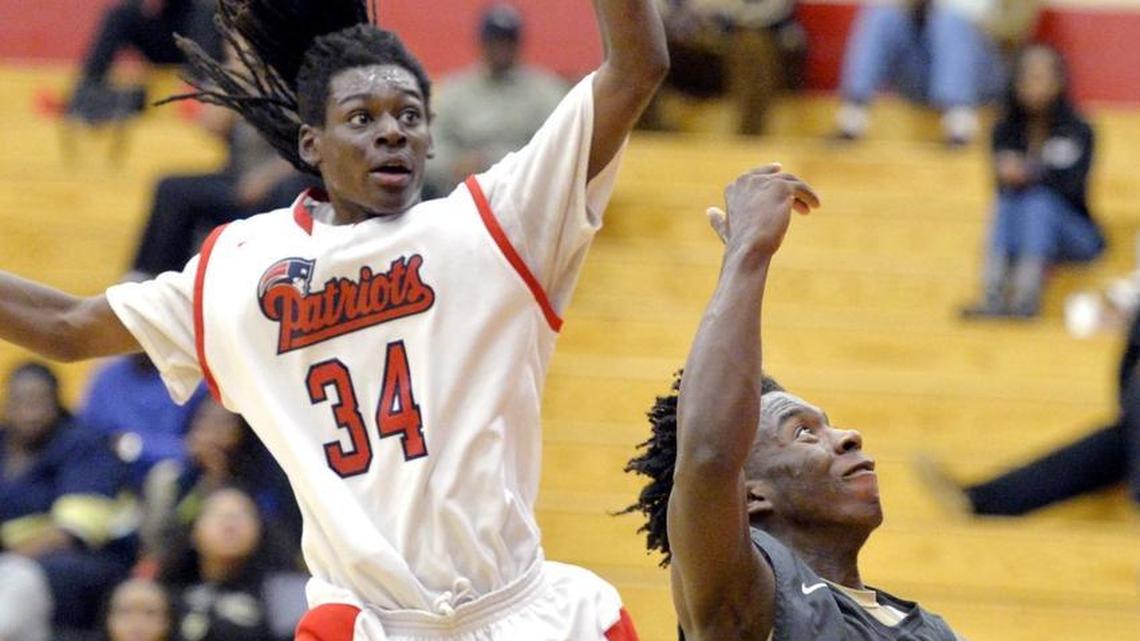 Washington County guard Monterrio Maze (2) puts up a shot over Southwest’s Kenterrious Goolsby (34) during their game Tuesday night.