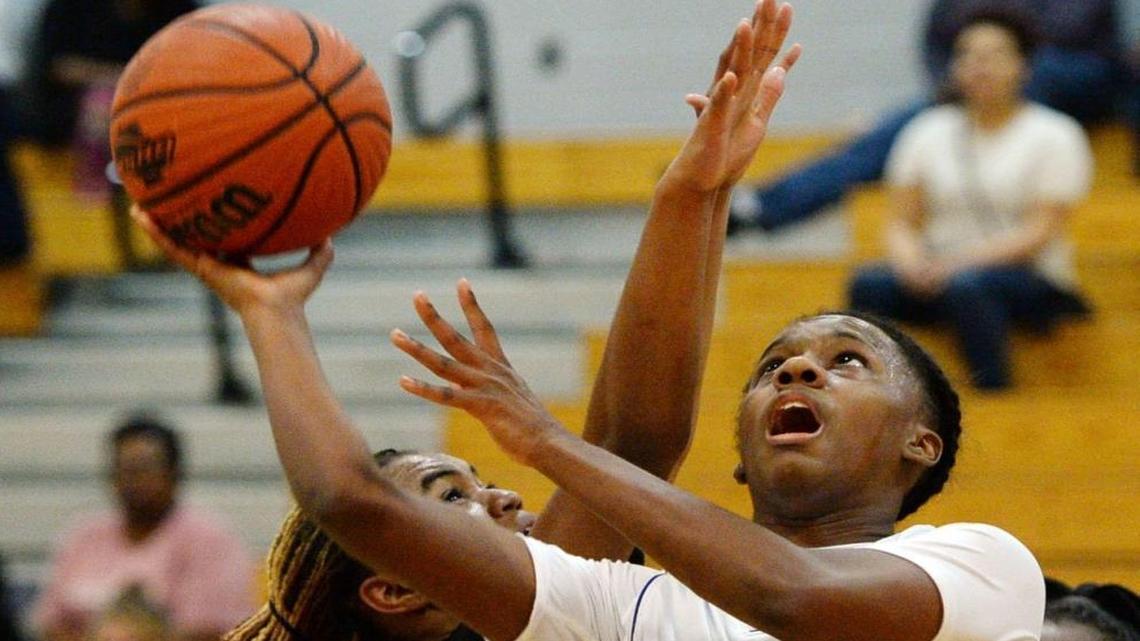 Central's JeNya Wilder (22) moves through the lane for a layup during second half action against Peach County.
