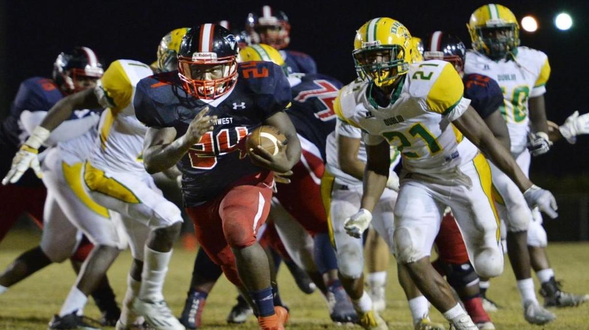 Running back Eduardo Green (24) and the Southwest Patriots travel to Washington County on Friday, Oct. 21, 2016, in a game that will determine first place in GHSA Region 3-2A.