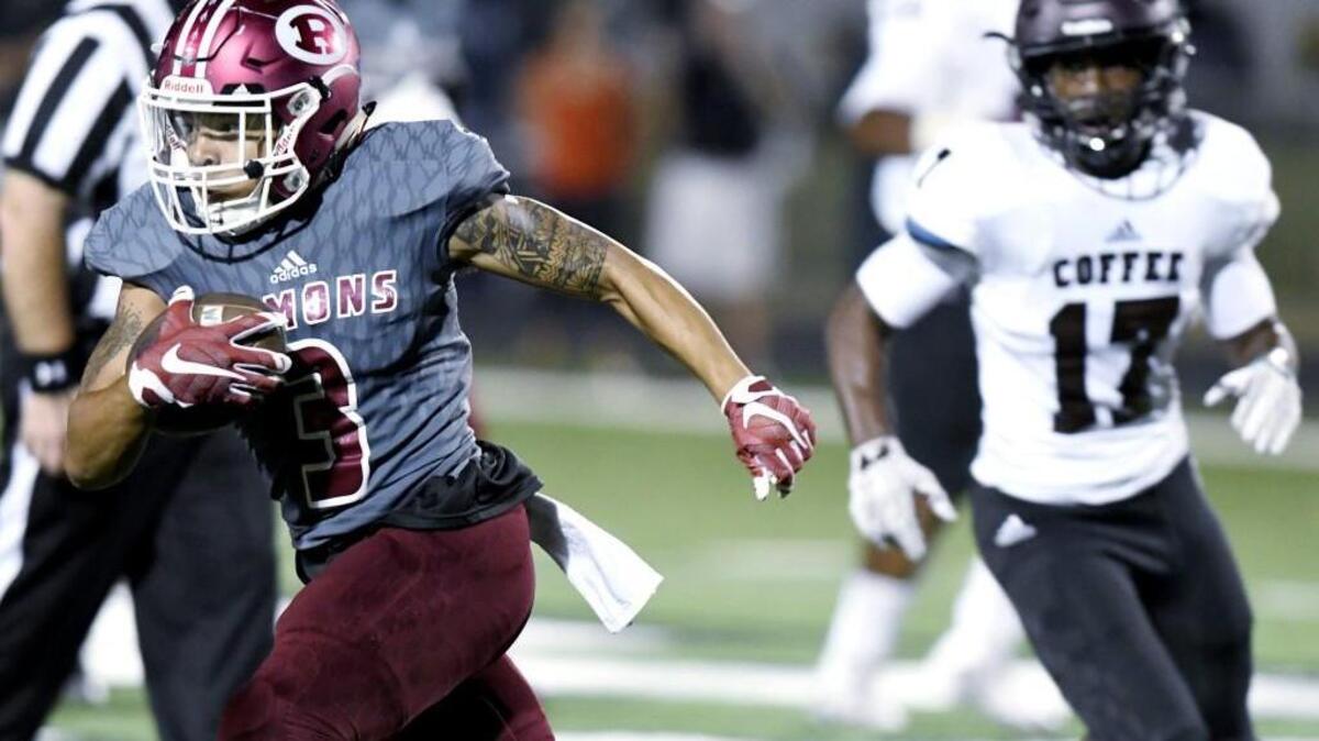 Warner Robins' Julius Cobbs (3) takes a crossing pattern downfield during their game against Coffee Friday night.