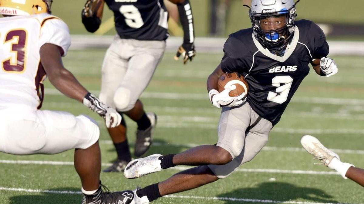 Houston County defensive back Kiefer Askew (3) returns an interception during the team’s scrimmage against Perry.