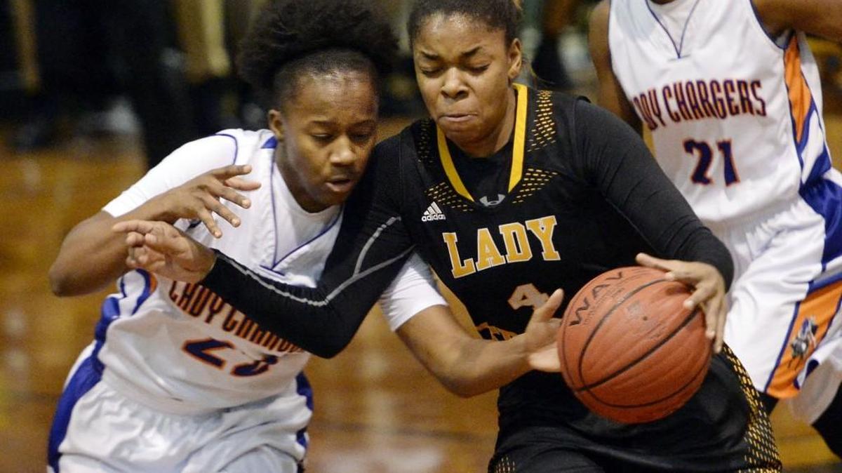 Peach County’s Danasia Shaw (4) collides with Central’s JeNya Wilder (22) during a game this season.
