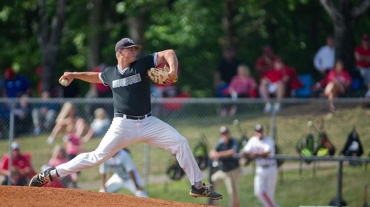 Houston County's Tony Locey delivers a pitch for the Bears on Monday against Gainesville.