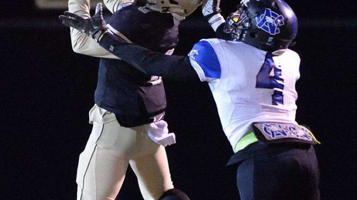 Tyricus Danielly, here intercepting a North Clayton pass, has been one of the newer players on defense who have steped up for Mary Persons.