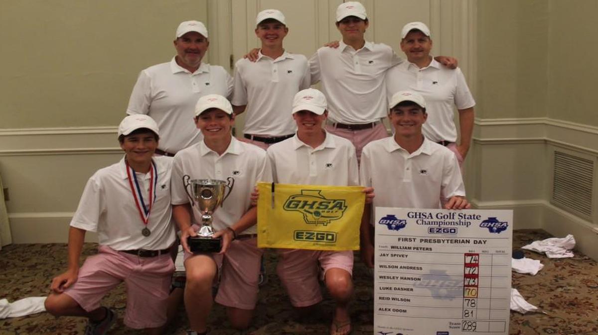 Members of the FPD boys golf team celebrate their GHSA Class 1A private school golf championship after rain forced cancellation of Tuesday’s final round.