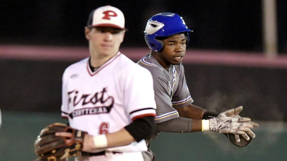 Tattnall Square’s Logan Simmons (14) claps his hands after a two-run double in the top of the third inning of their game at FPD on March 21.