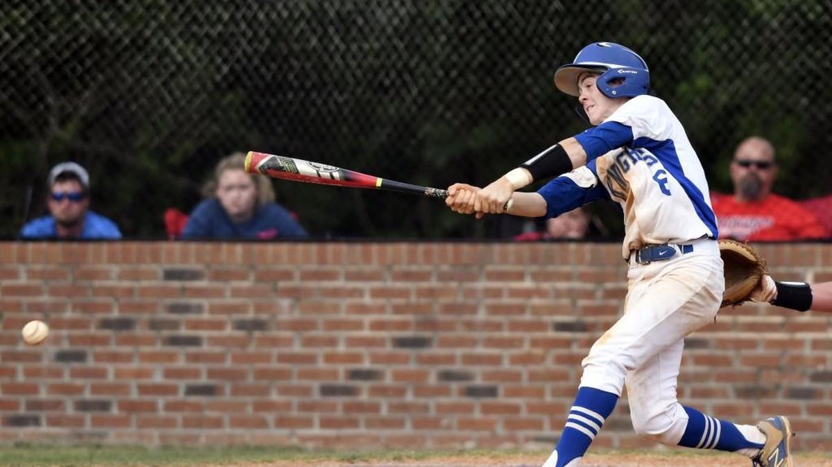 Windsor shortstop Brayden Leslie (6) hits an RBI single during their GISA playoff game against Memorial Day Friday.