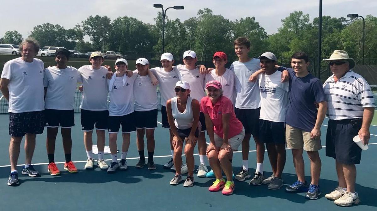 Members of the Stratford boys tennis team celebrate their GHSA Class 1A private school semifinal victory Saturday over Atlanta International.