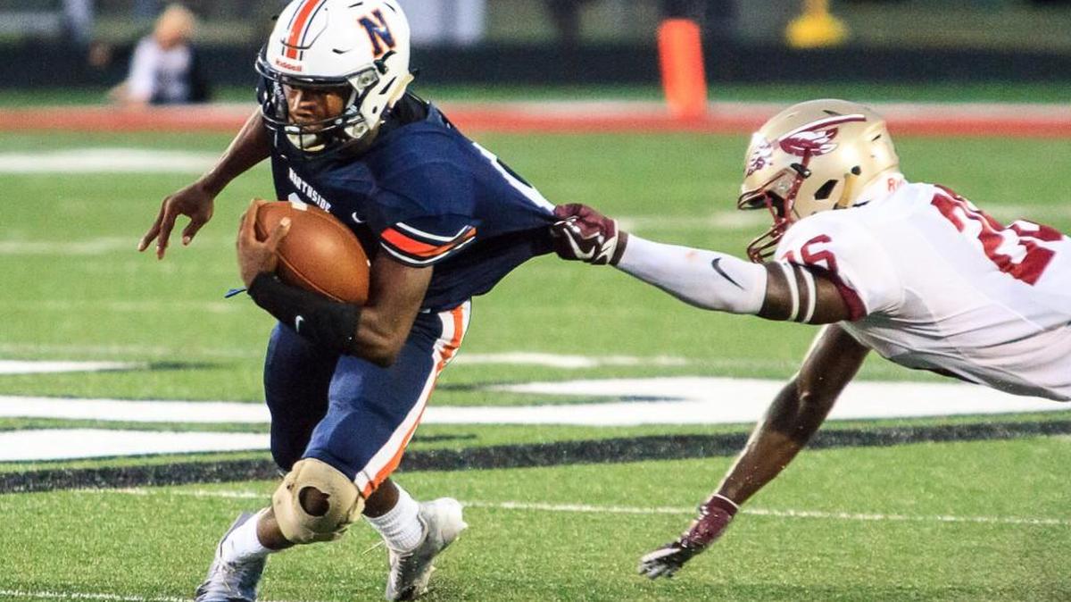 Northside's Daniel Neal (8) breaks free from Westside's Tavores Pearson, Jr (26) Friday night.