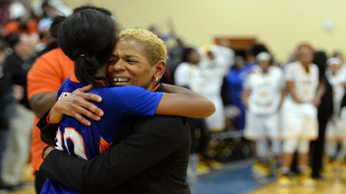 Central head coach Sheila Toombs, right, led the Chargers to their first region championship.