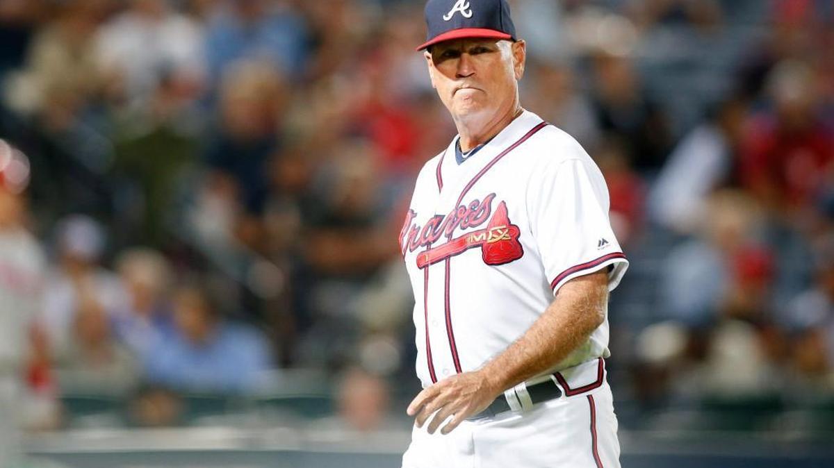 Brian Snitker walks to the dugout in the eighth inning of a baseball game against the Philadelphia Phillies on Sept. 29.