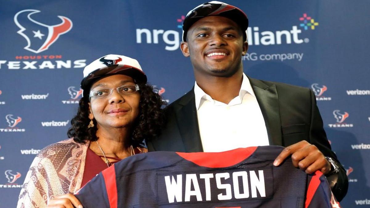 Quarterback Deshaun Watson, right, poses with his mother, Deann, after a Houston Texans news conference Friday in Houston.