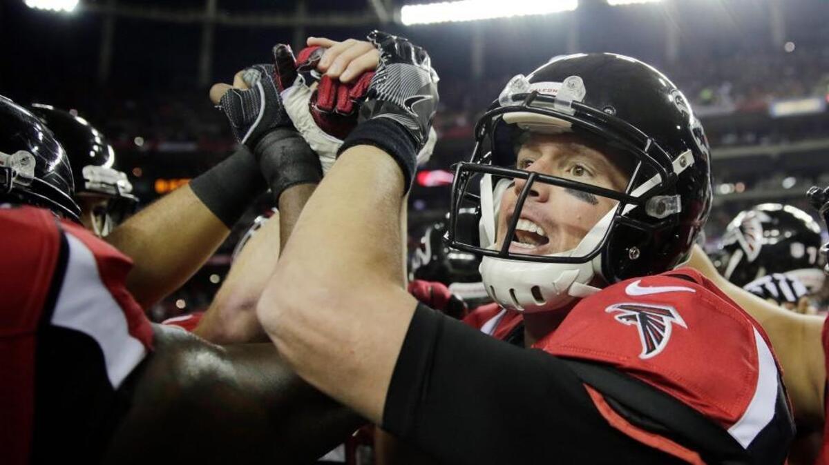Atlanta quarterback Matt Ryan, right, and the Falcons host Seattle in the NFC playoffs Saturday.