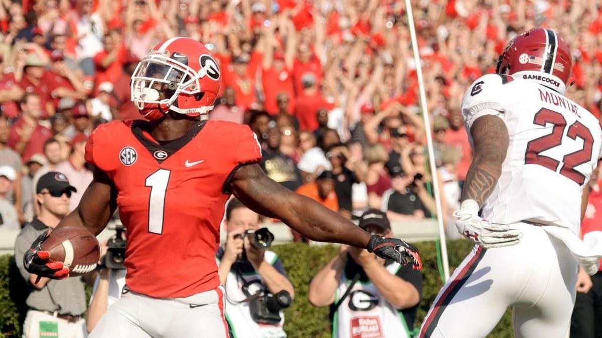 Georgia running back Sony Michel (1) celebrates a touchdown during their game against South Carolina Saturday.