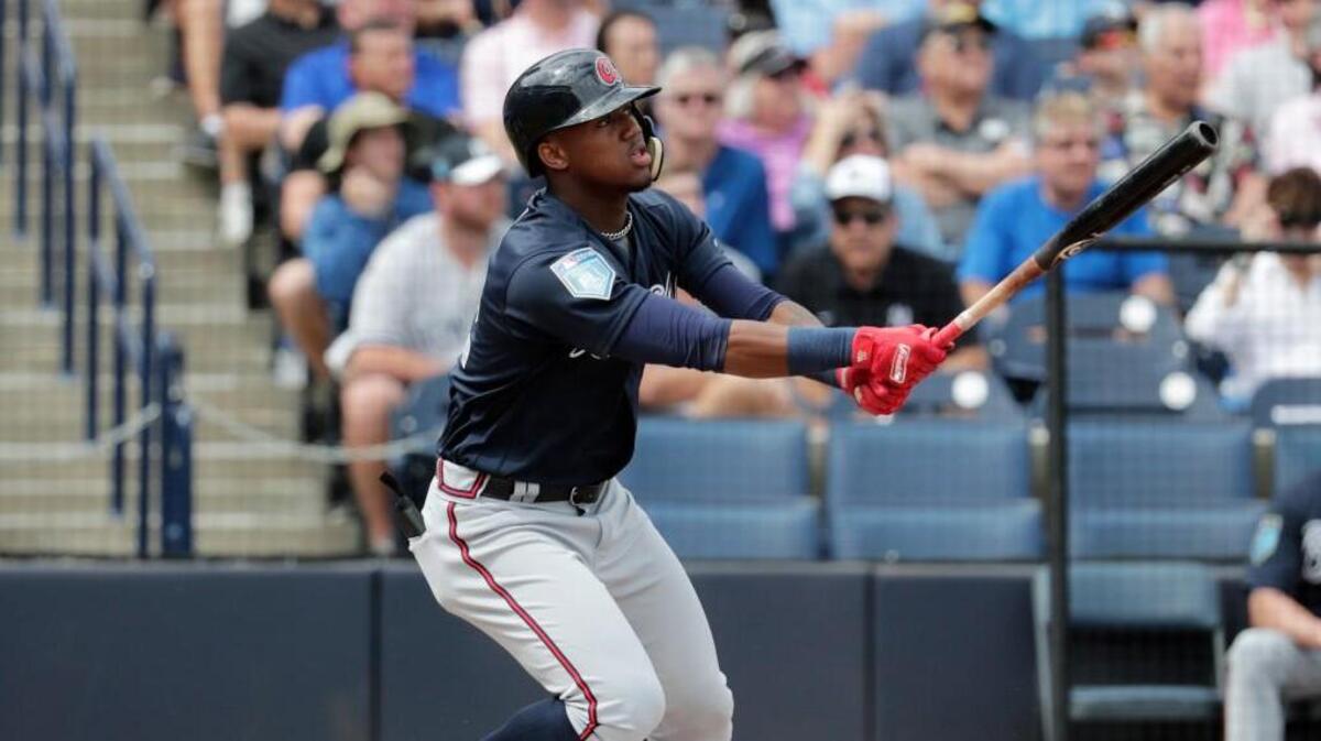 Atlanta Braves' Ronald Acuna watches after hitting a two-run home run during the first inning of Friday’s spring exhibition game against the New York Yankees in Tampa, Fla.