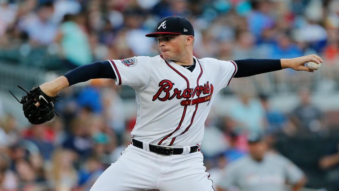 Atlanta Braves starting pitcher Sean Newcomb worked out of two sixth-inning jams Friday against Miami.