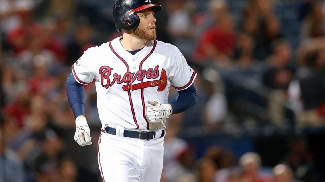 Atlanta first baseman Freddie Freeman (5) and the Braves open SunTrust Park this season.