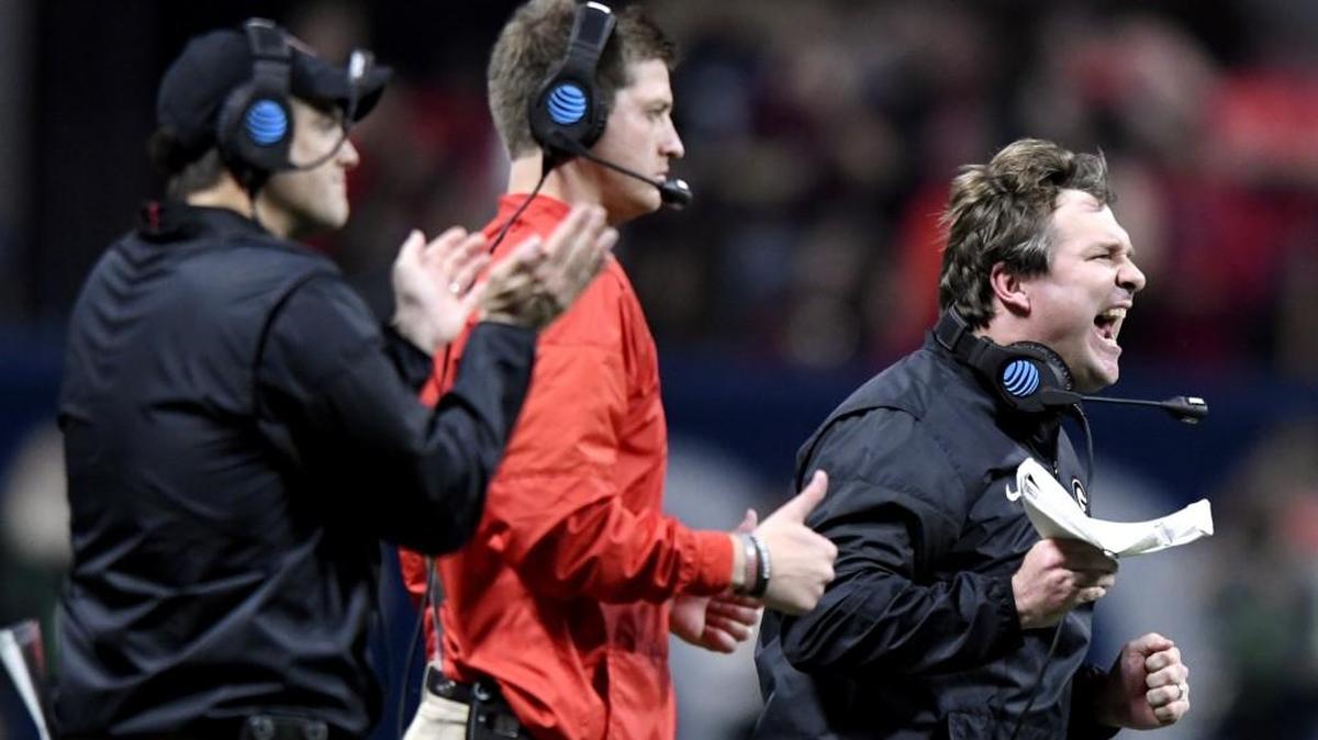 Georgia head coach Kirby Smart barks as this team during second half action of the SEC Championship victory against Auburn last season.