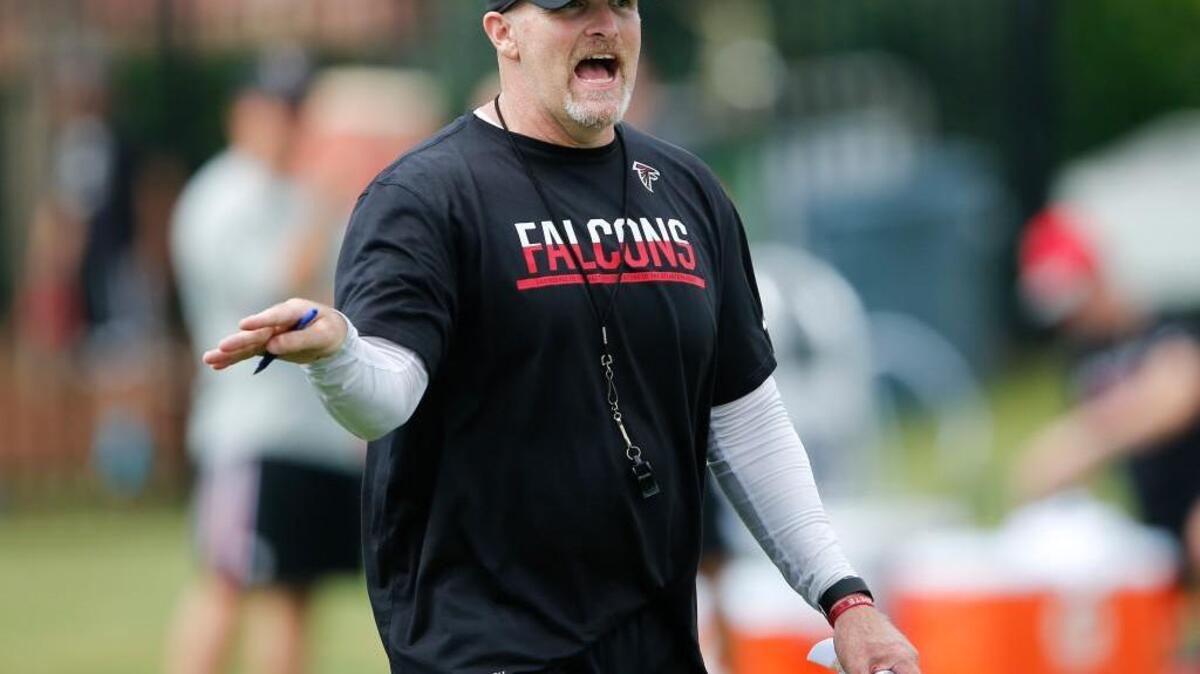 Atlanta Falcons head coach Dan Quinn directs his team during an NFL football practice Thursday.