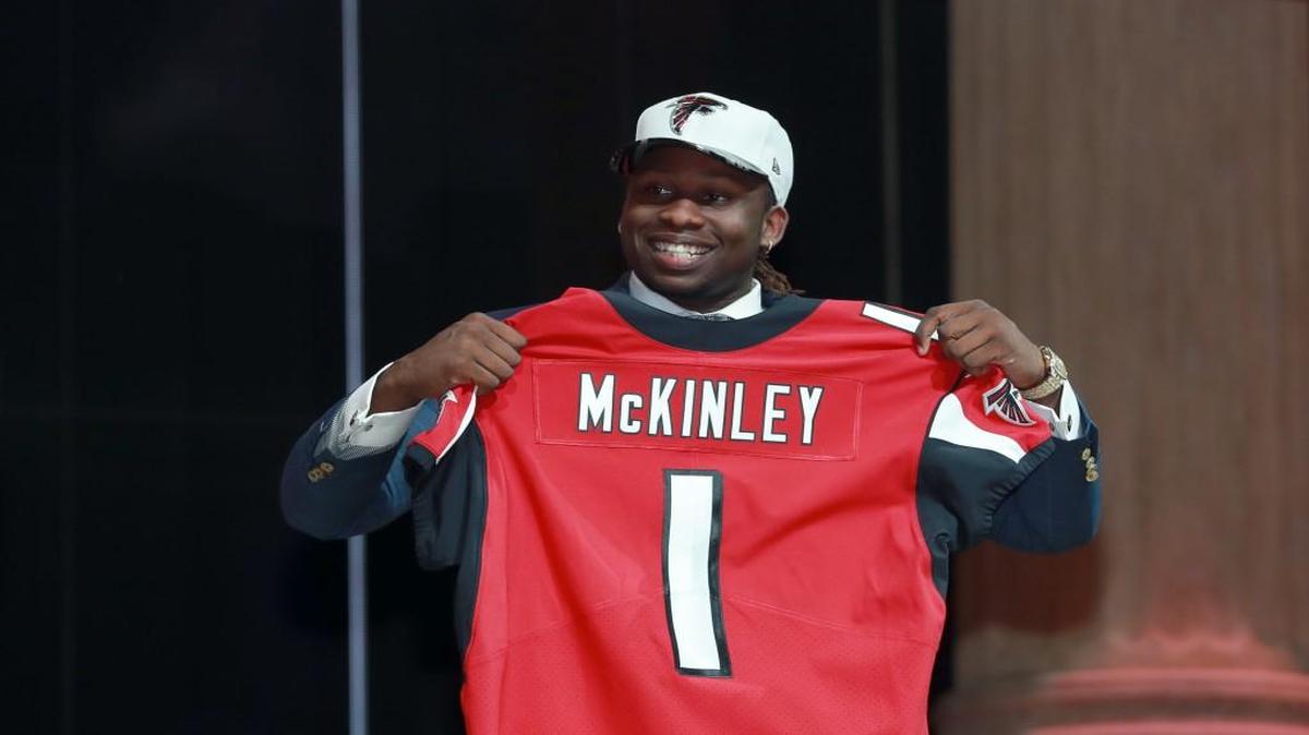 UCLA's Takkarist McKinley poses after being selected by the Atlanta Falcons during the first round of the NFL draft Thursday in Philadelphia.