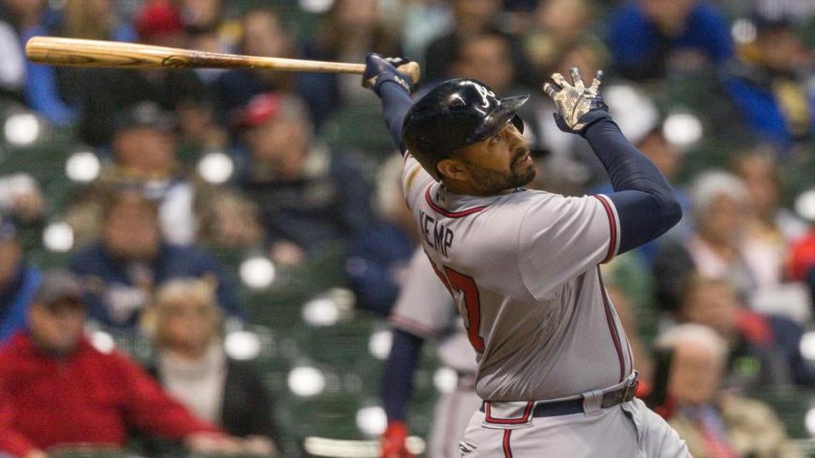 Atlanta Braves' Matt Kemp watches his third home run of a baseball game fly over the right field wall against Milwaukee Brewers' Jhan Marinez during the eighth inning Saturday, April 29, 2017, in Milwaukee.