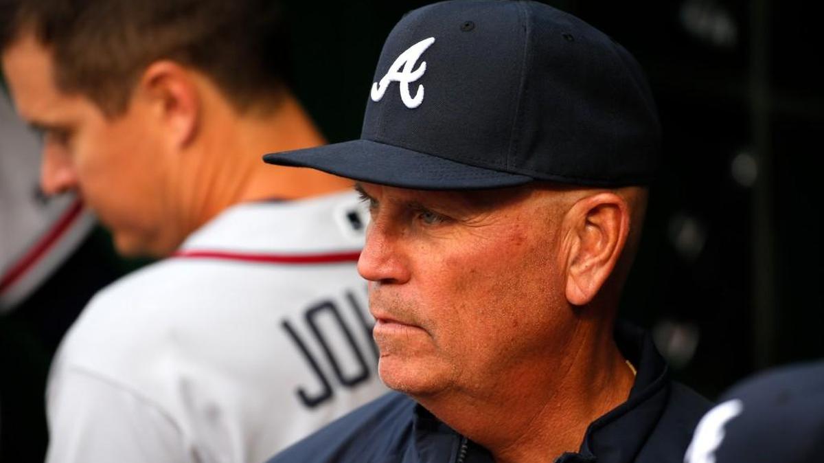 Atlanta Braves interim manager Brian Snitker stands in the dugout before a baseball game against the Pittsburgh Pirates on May 17 in Pittsburgh.